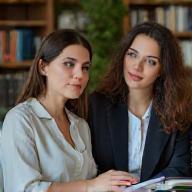 Lucia Bianchi consulting with an aspiring author