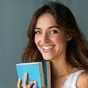 Giulia Ricci smiling with a book